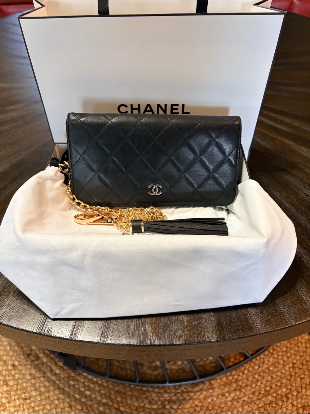 CHANEL Black Quilted Lambskin Crossbody with Gold Chain and Tassel